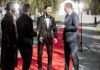 Movie actors on the red carpet outdoors